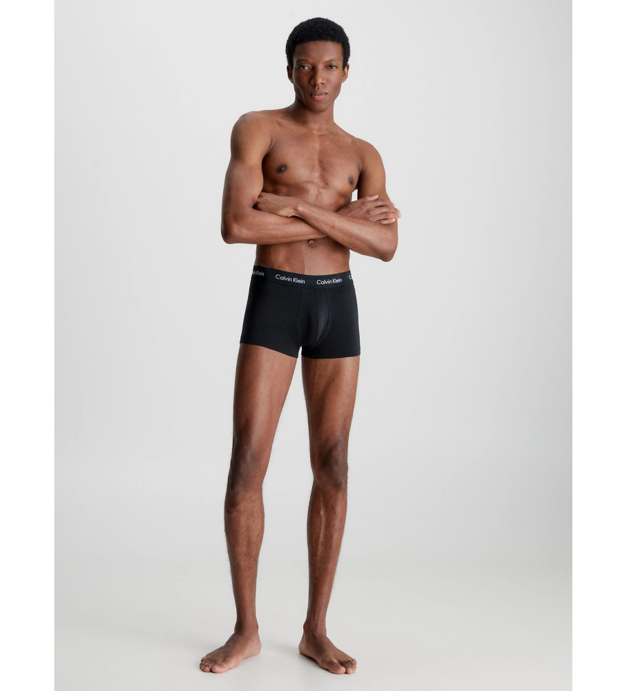 Conjunto de 3 cuecas boxer Calvin Klein de cintura baixa em algodão elástico, pretas e cinzas.