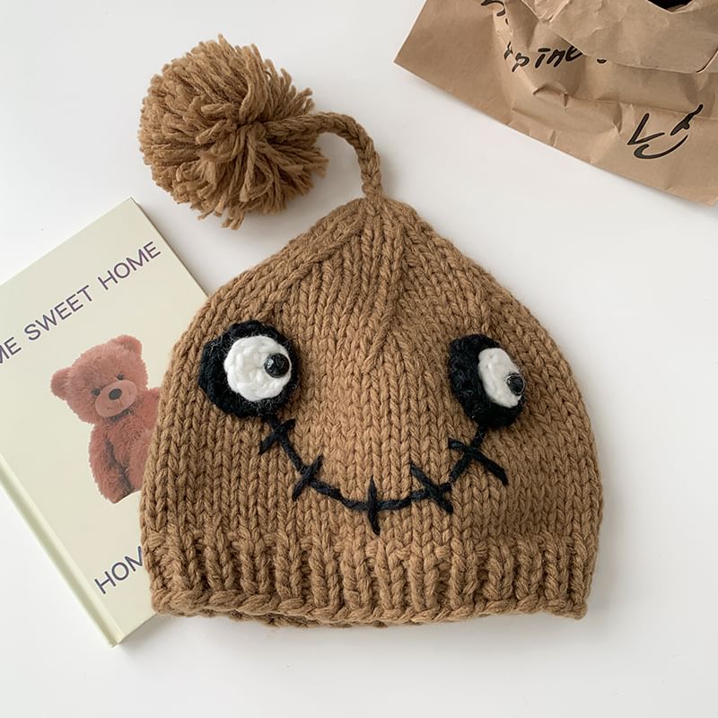 Amandier - Monster Pom Pom gebreide muts