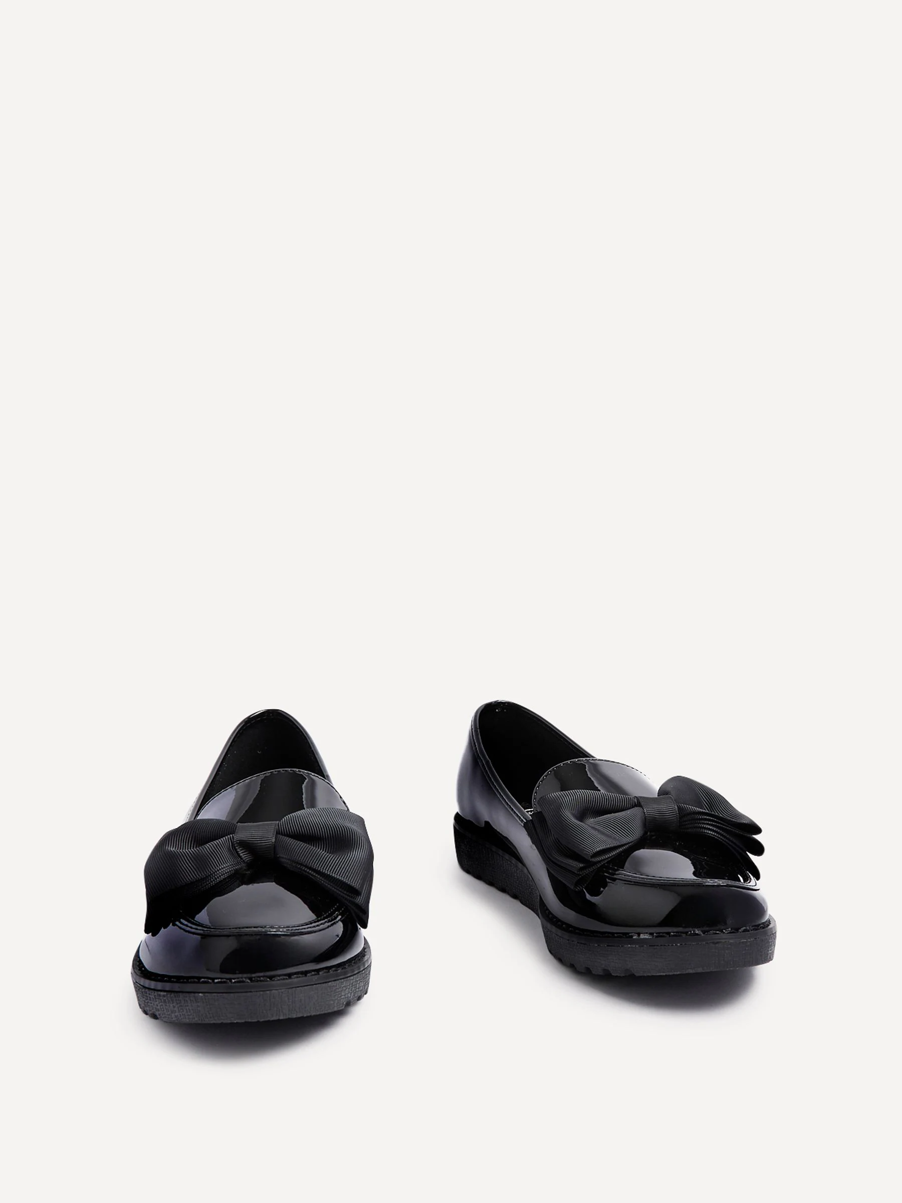 Zwart - Linzi Cathy loafers met plateauzool en grote strik