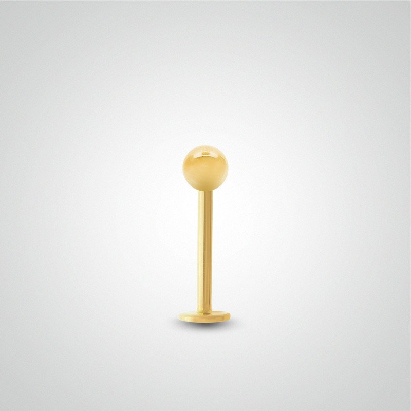Piercing tragus en or jaune avec boule