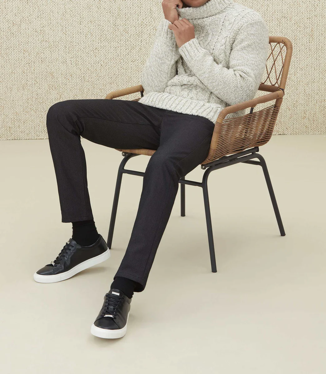 Pull col roulé beige à torsades 