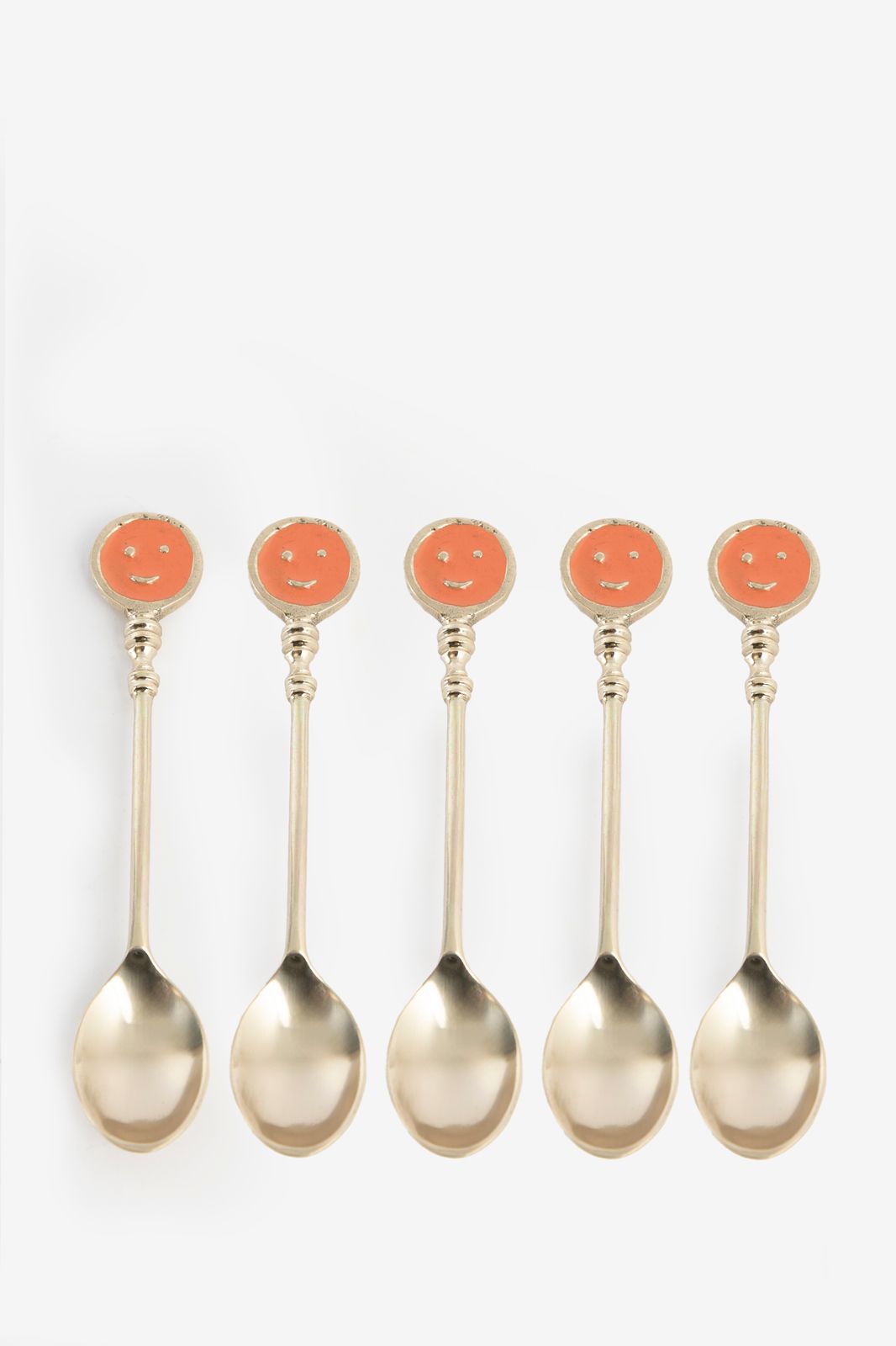 Messing theelepels met smiley