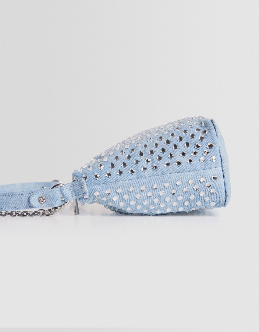 Bolsa transversal multifuncional em jeans com strass.