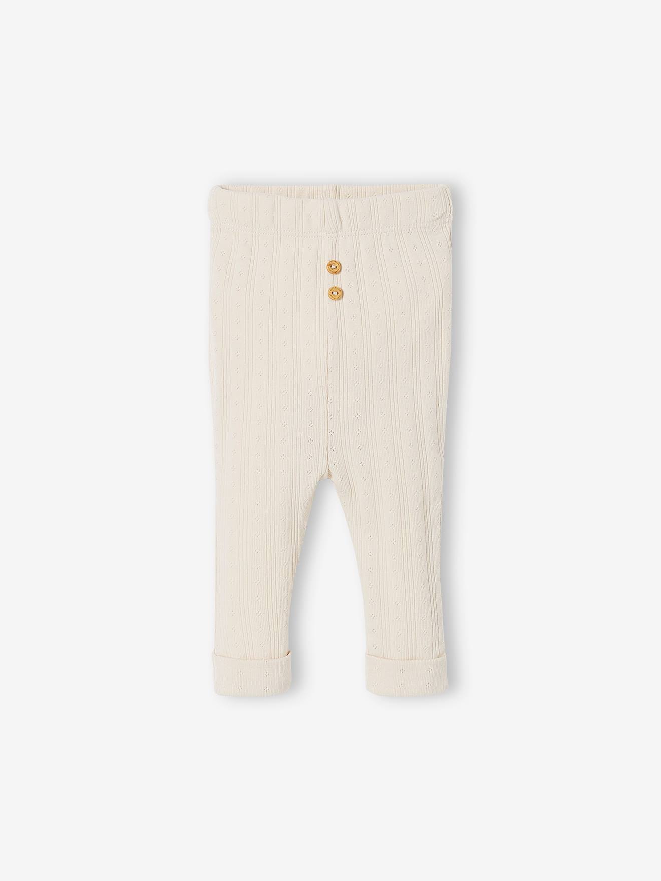 Conjunto de malha vazada composto por camiseta e calça, cor bege claro liso para bebês.
