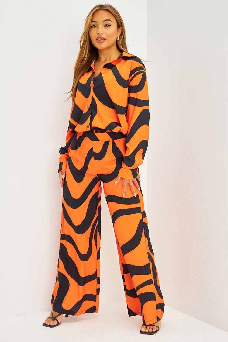 Ensemble fluide chemise + pantalon à lignes courbes orange