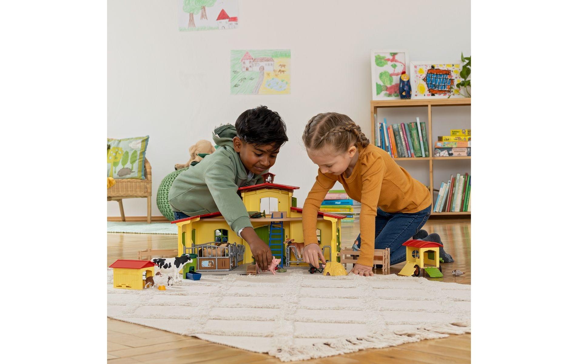 Spielfigurenset Farm World Stall mit Tieren und ZubehörBauernhof-Spielset