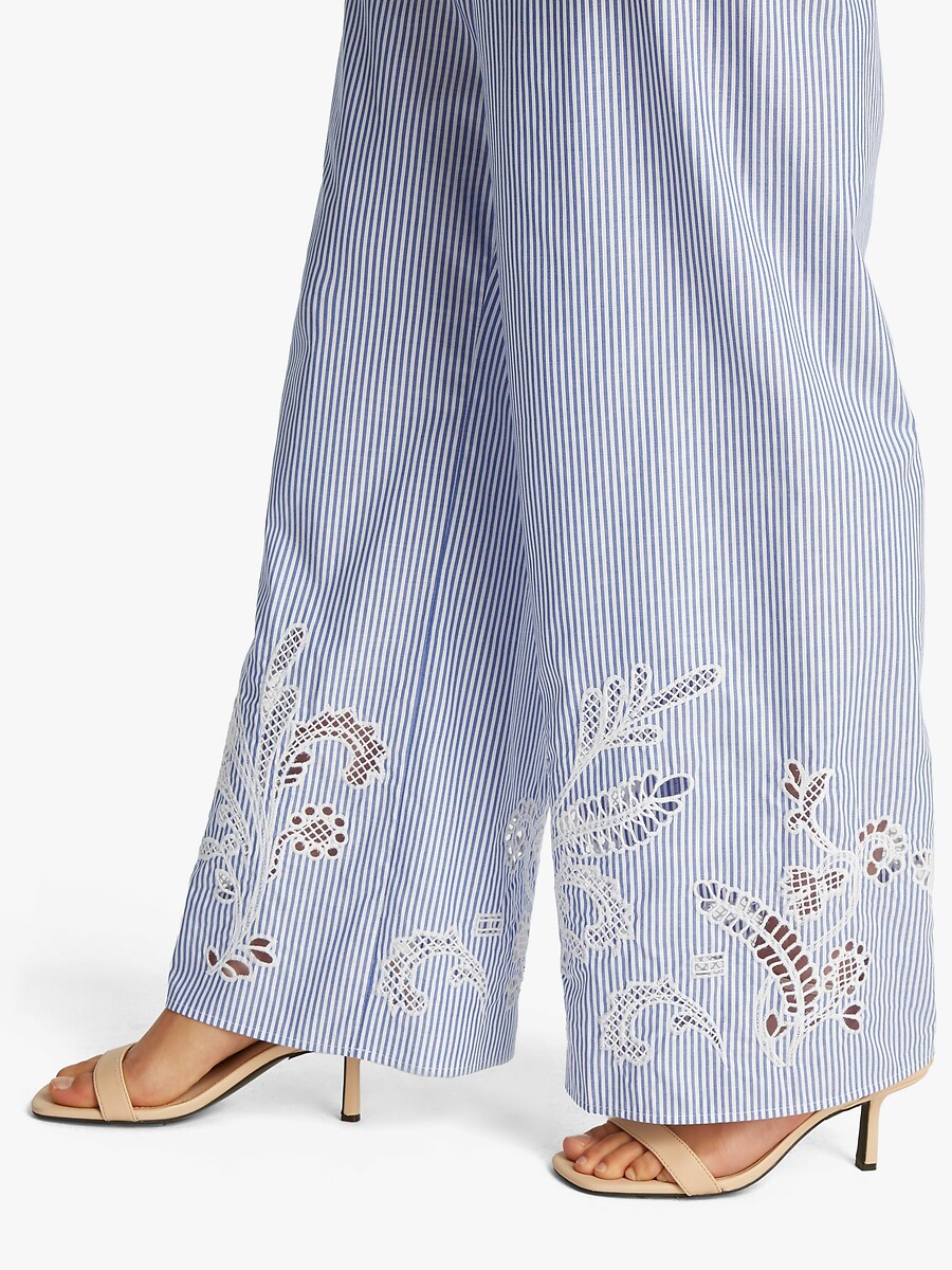 TOMMY HILFIGER<br>Calças de pernas largas com bordados