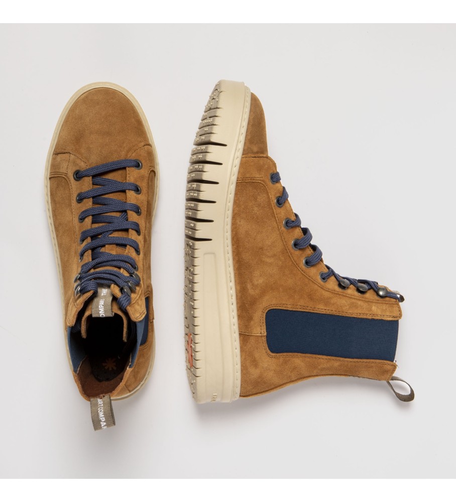 Botas de tornozelo em couro marrom artístico