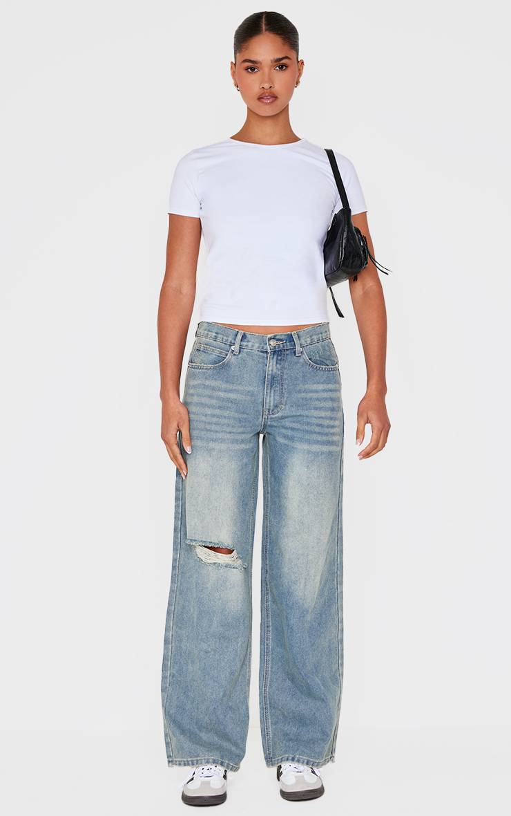 Délavage Vintage Jean Boyfriend Vintage Déchiré Aux Genoux Ourlet Effiloché