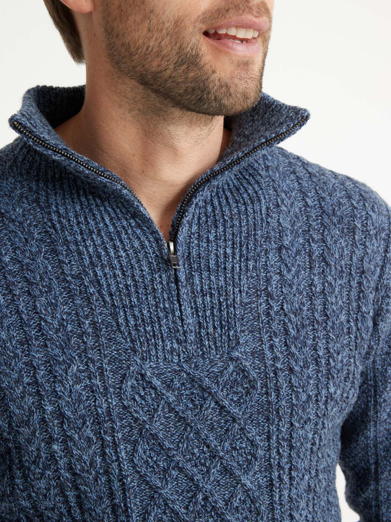 Pull torsadé col montant zippé