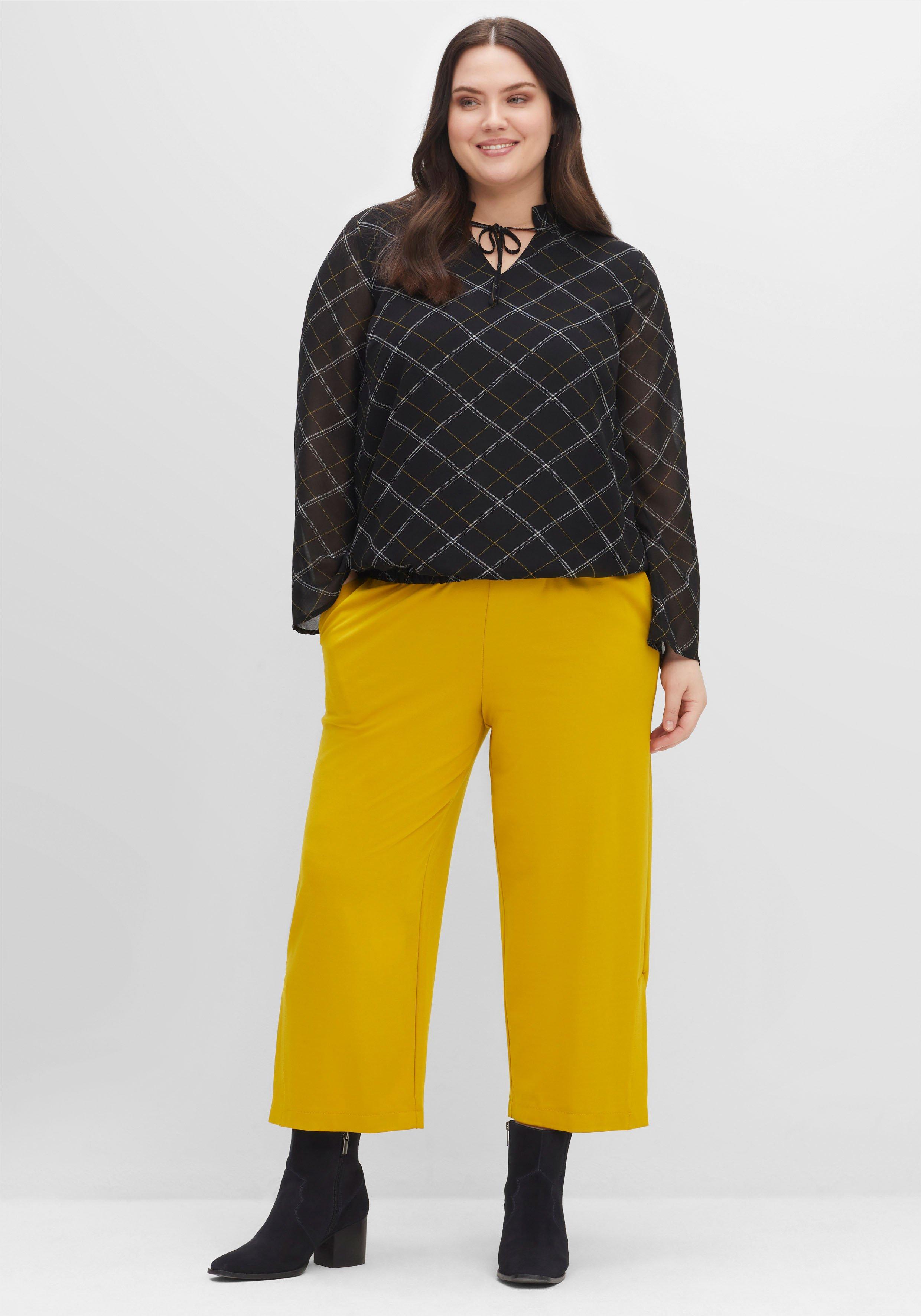 Weite 7/8-Hose mit Schlupfbund und hohem Schlitz
