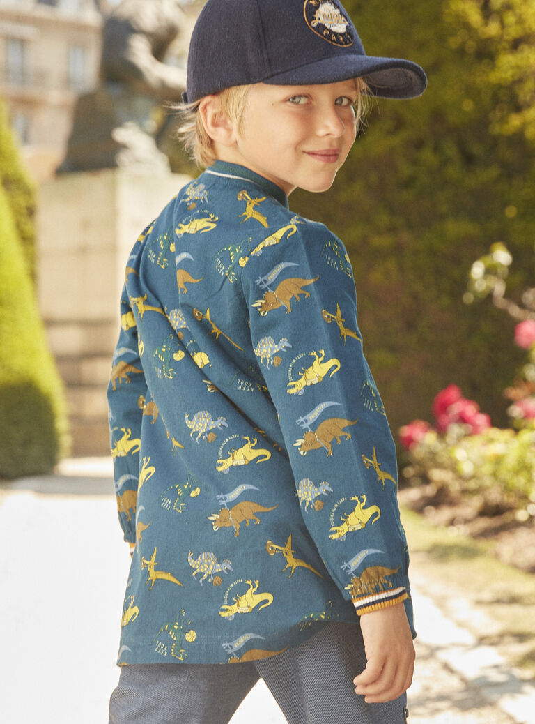 Blouse scolaire bleu pétrole à imprimé dinosaures