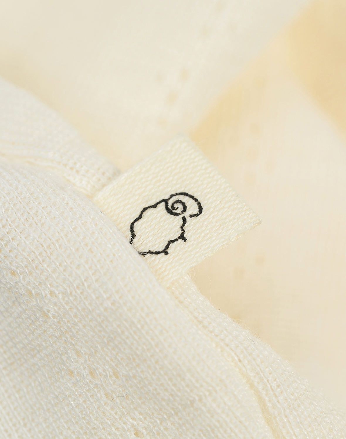 Pointelle romper met lange mouw van merinowol/zijde voor baby's