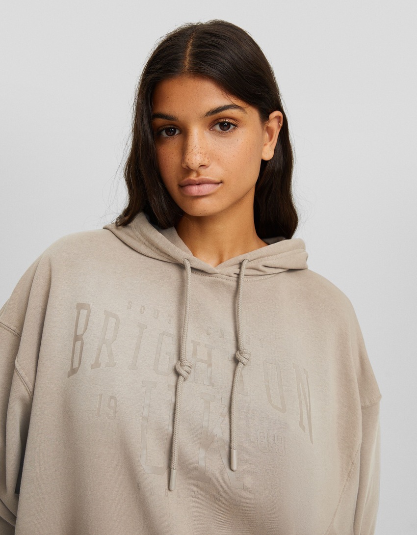 Moletom oversized com efeito desbotado e slogan