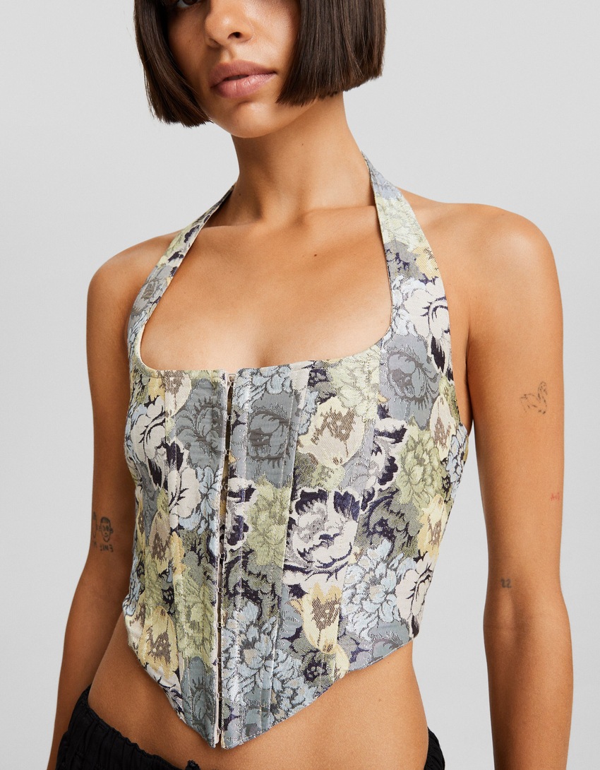Blusa aberta nas costas com amarração em jacquard