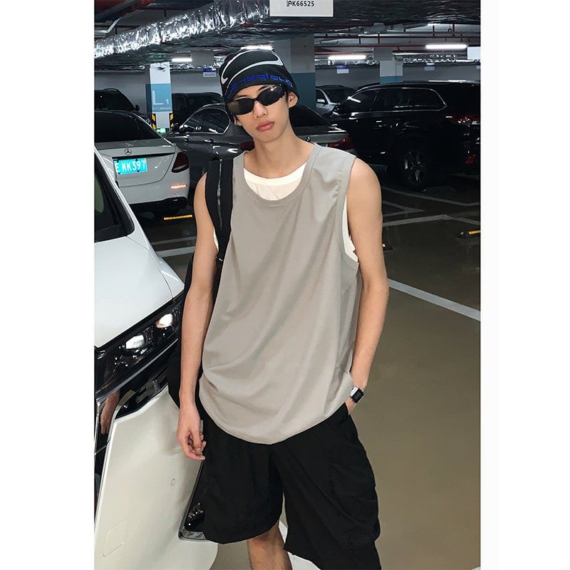 Orungeetun - Tweekleurige tanktop in namaakstijl