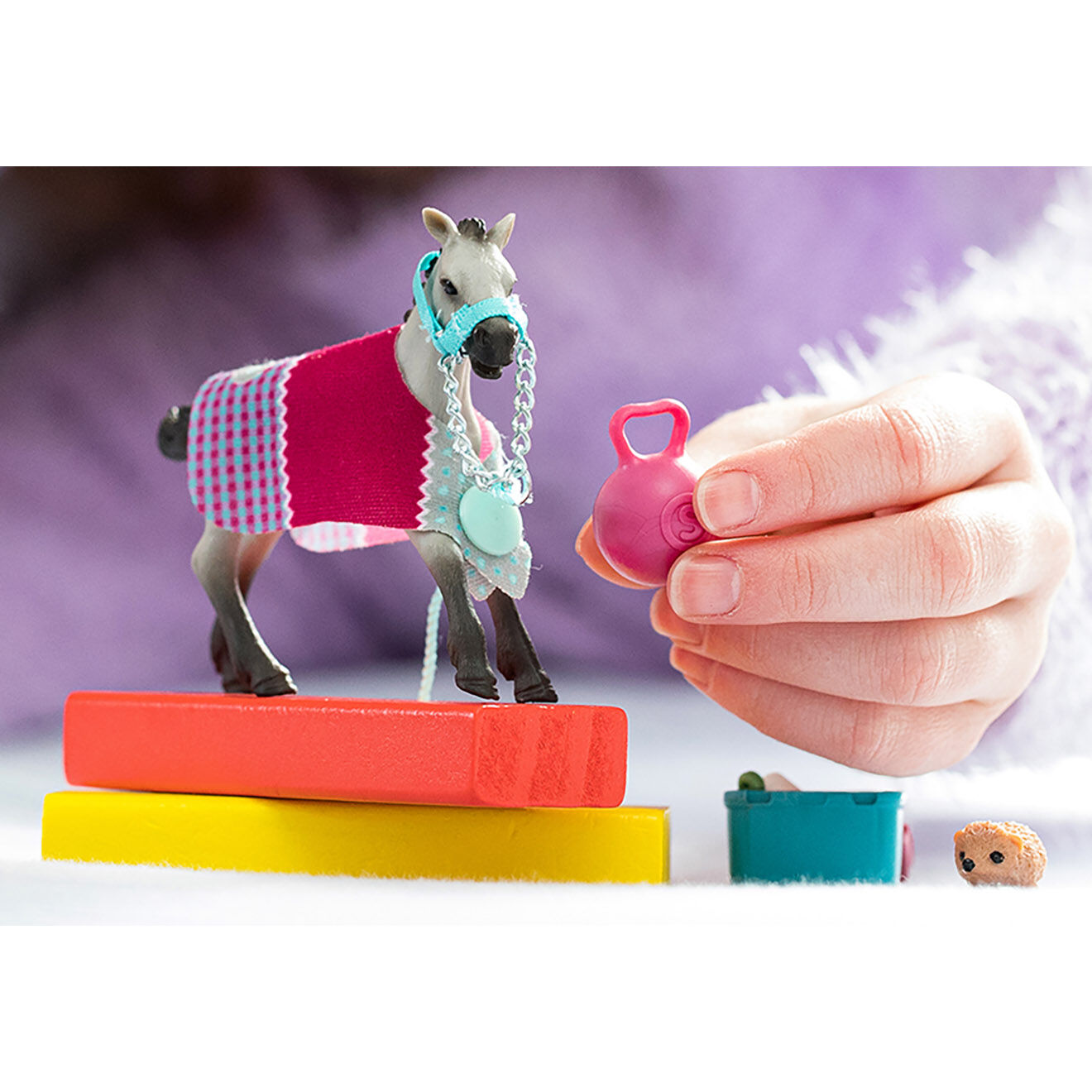 Schleich Poulain joueur multicolore