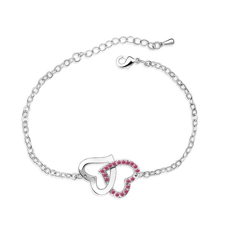 Bracelet Coeurs entrelacés orné de Cristal rose de Swarovski
