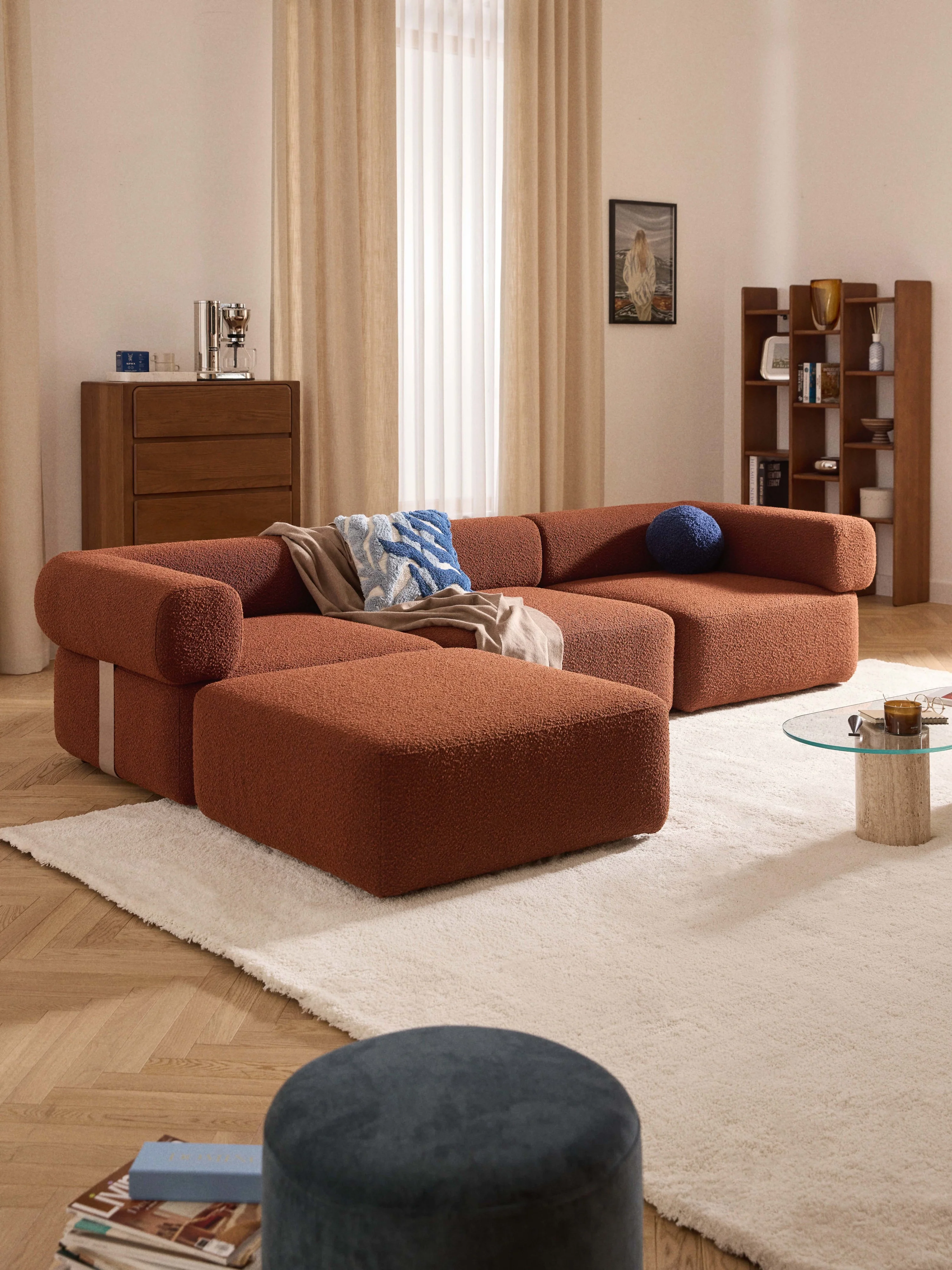 Modulaire bank Anton (4-zits) met poef (links/rechts) van bouclé