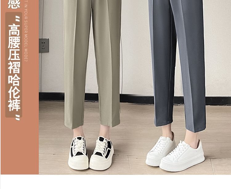 Jaqmine - Hoge taille effen cropped taps toelopende pantalon