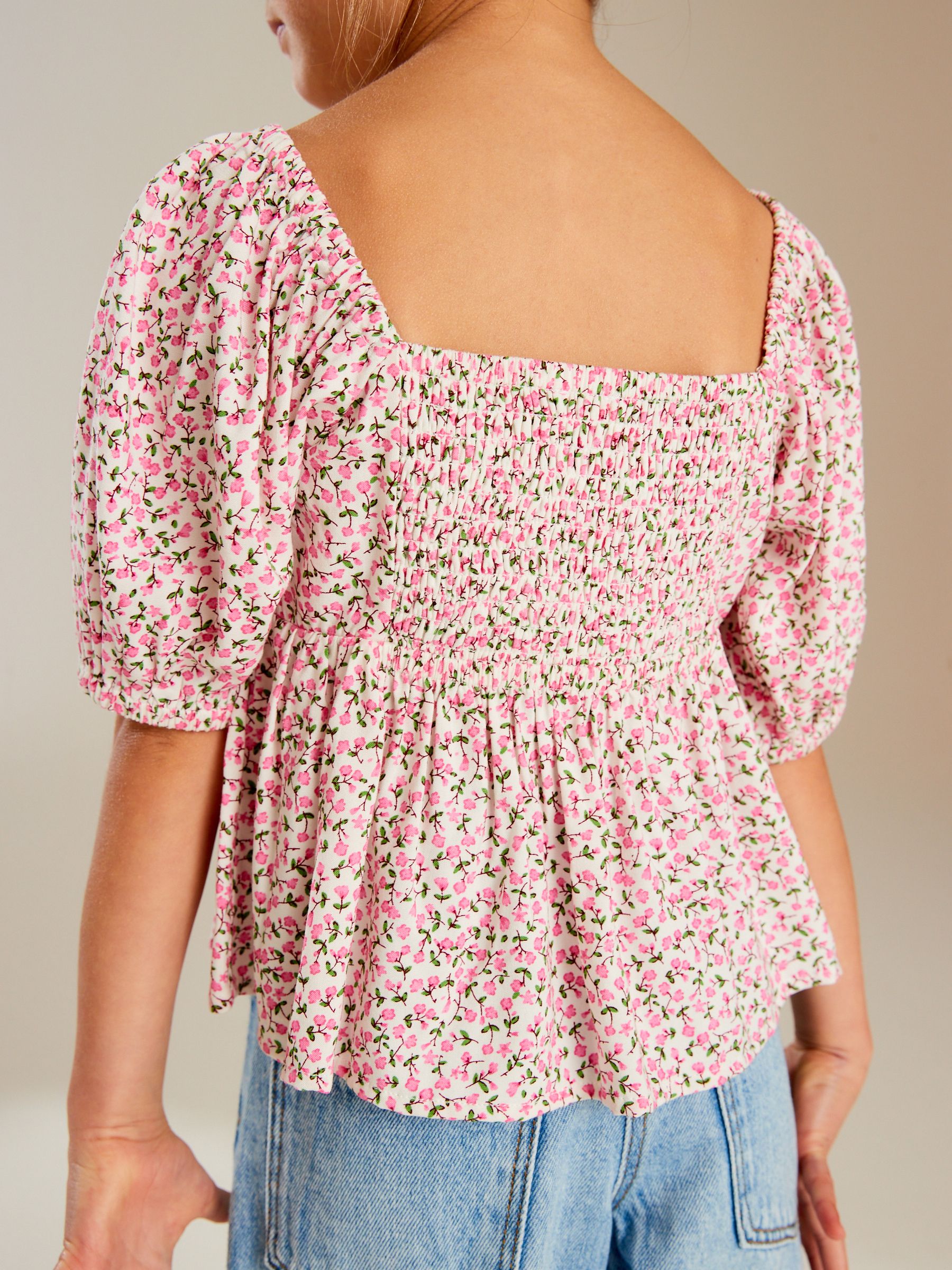 Roze met vrolijke print - Blouse met uitsnijding (3-16 jr)