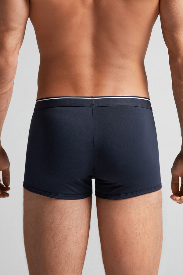 Cuecas boxer em algodão Supima® com elástico visível.