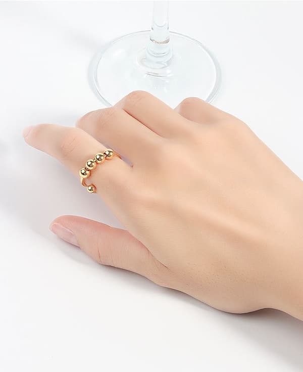 INF Avstressende ring som kan justeres i kobber, sølvfarget Gull