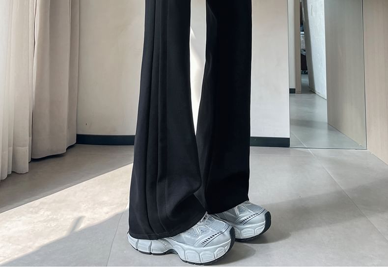 Tel tot 10 - Effen wijd uitlopende broek met trekkoord in de taille (verschillende ontwerpen)