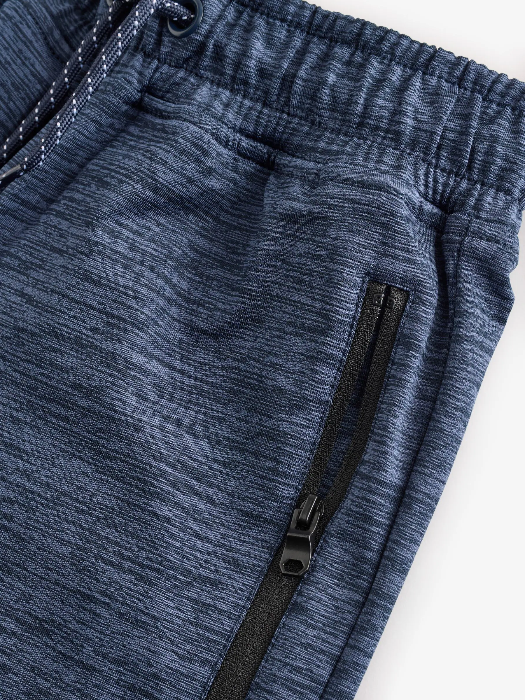 Zwart/marineblauw - Slim-fit joggingbroek met ritszak (3-16jr)