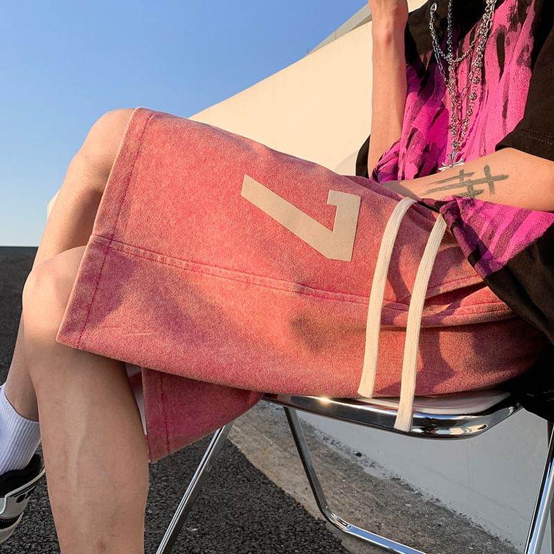 Kimeya - Gewassen sweatshorts met trekkoord en nummerprint