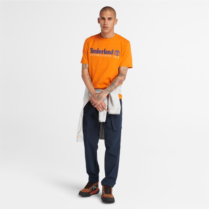 Camiseta masculina laranja da equipe Est. 1973