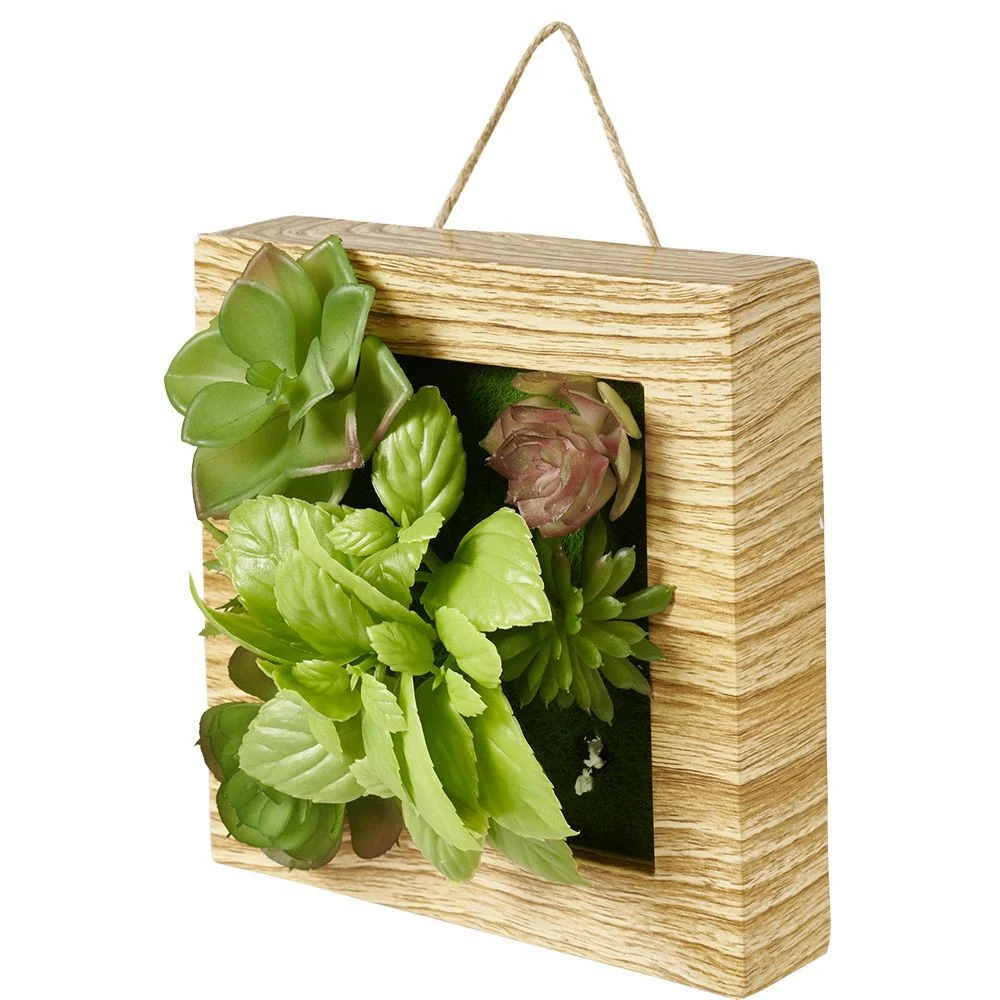 Plante artificielle dans cadre à suspendre 20x20cm