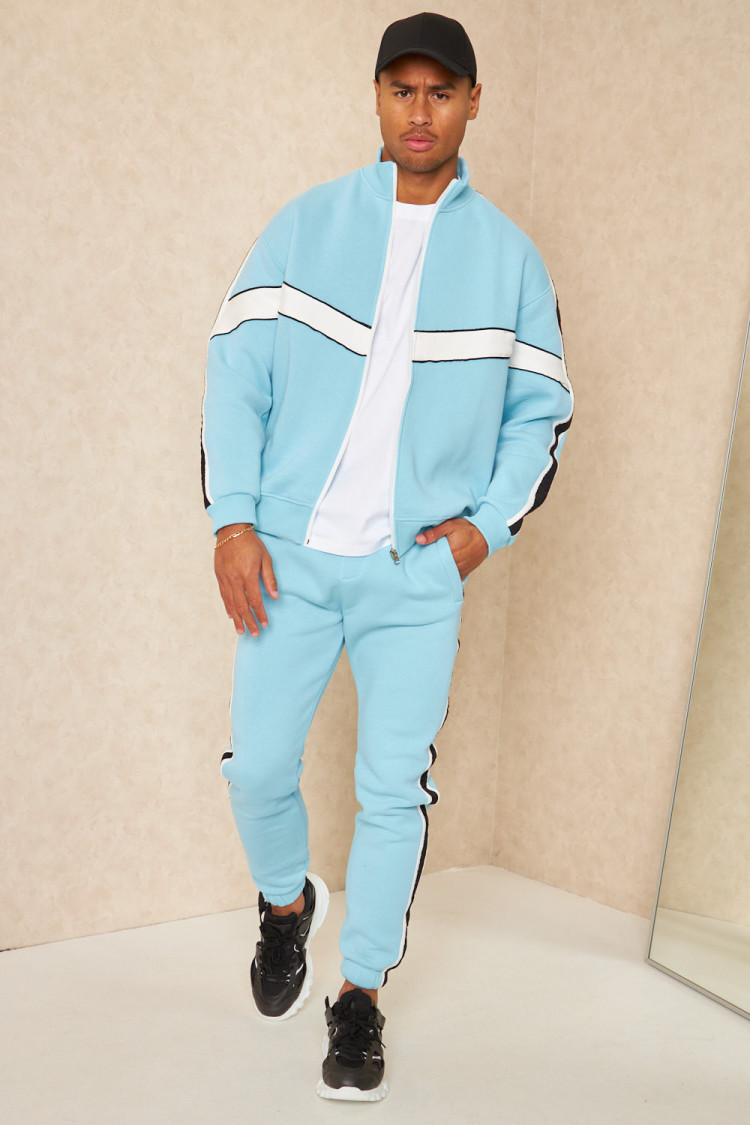 Ensemble 2 pièces veste + jogging à rayures bleu clair