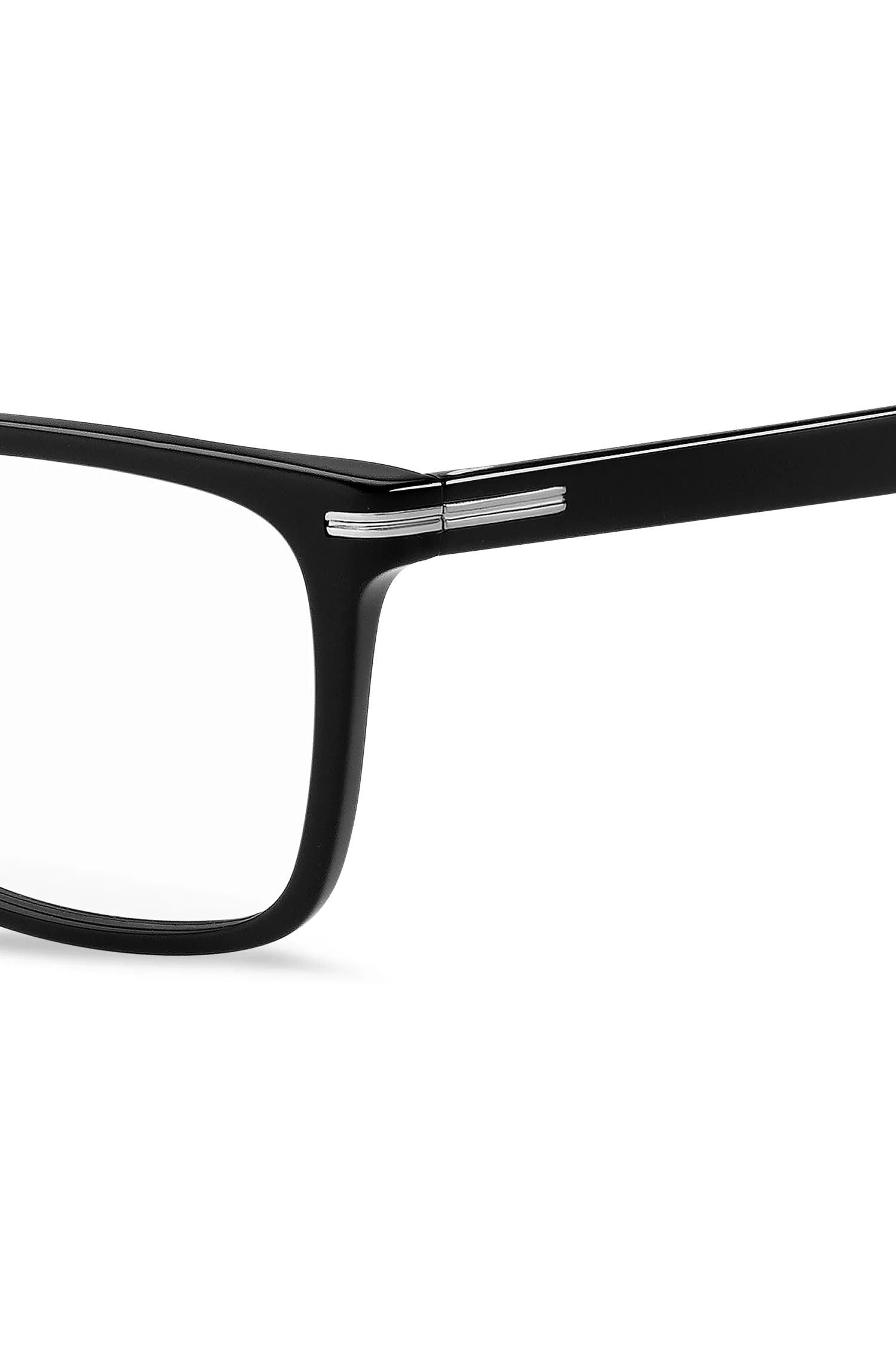 Armação de óculos BOSS em acetato preto com detalhes prateados exclusivos.