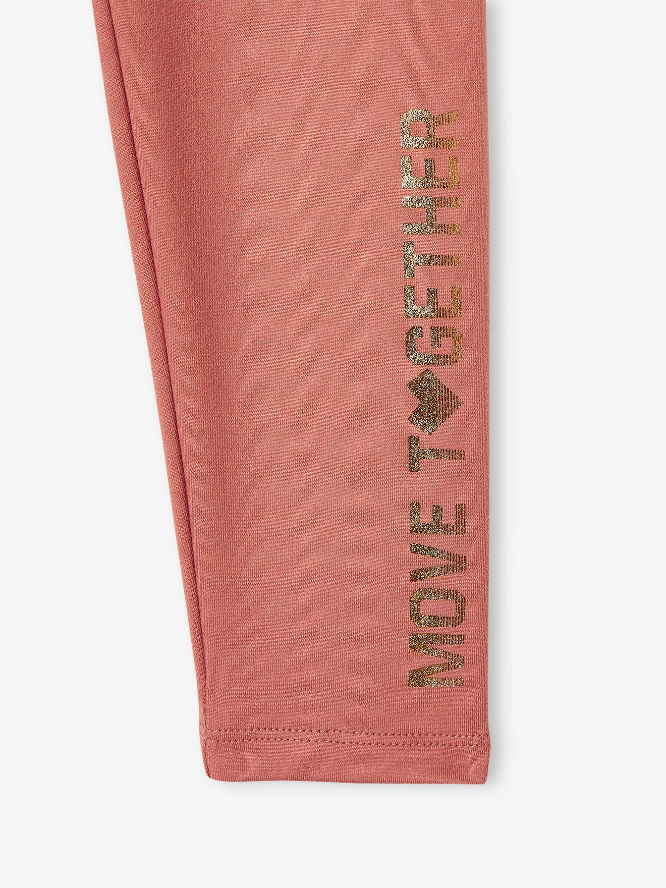 Leggings esportivas lisas rosa claro para meninas com letras metálicas na perna.