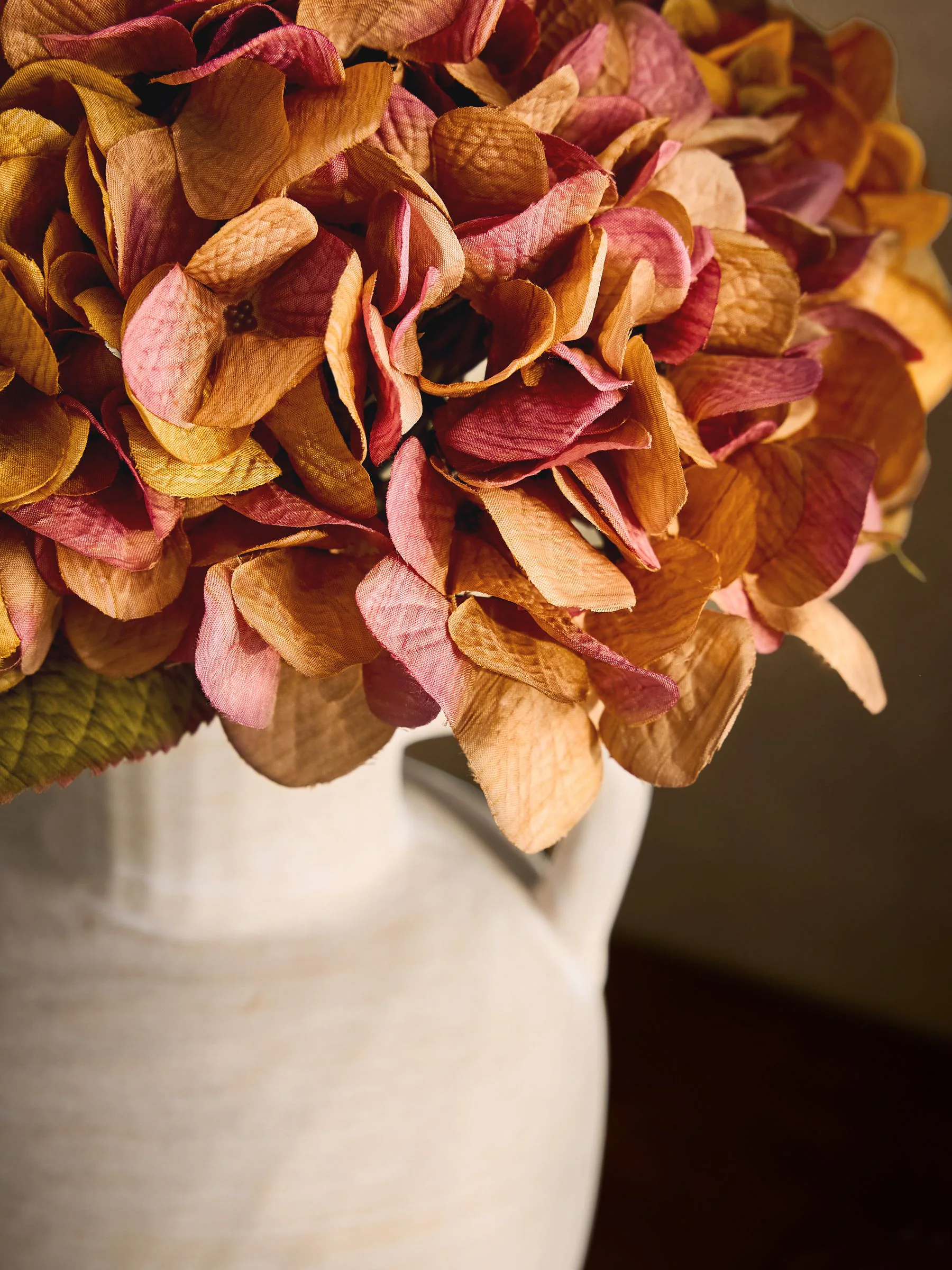 Artificial Hydrangea Heads In Large Ceramic Urn Vase