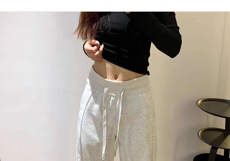 evanesce - Effen joggingbroek met trekkoord in de taille en wijde pijpen