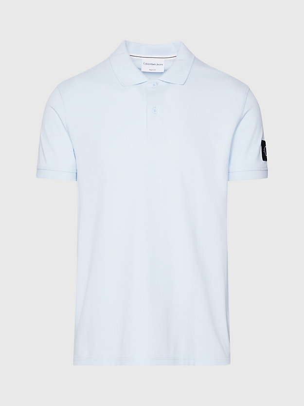 Camisa polo com brasões