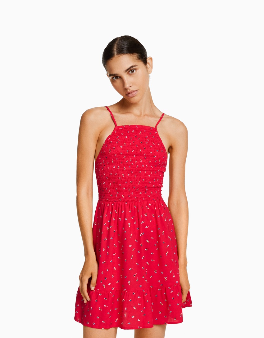Vestido curto com estampa e decote halter