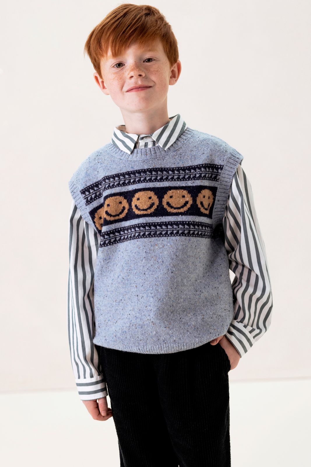 Blauwe gebreide spencer met artwork