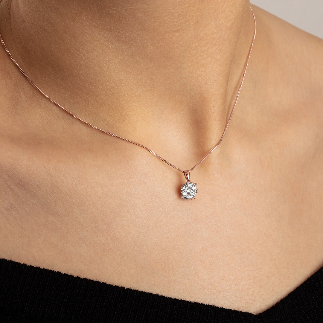 Anhänger 750/18 K Roségold mit Diamanten 0.33 ct H/si