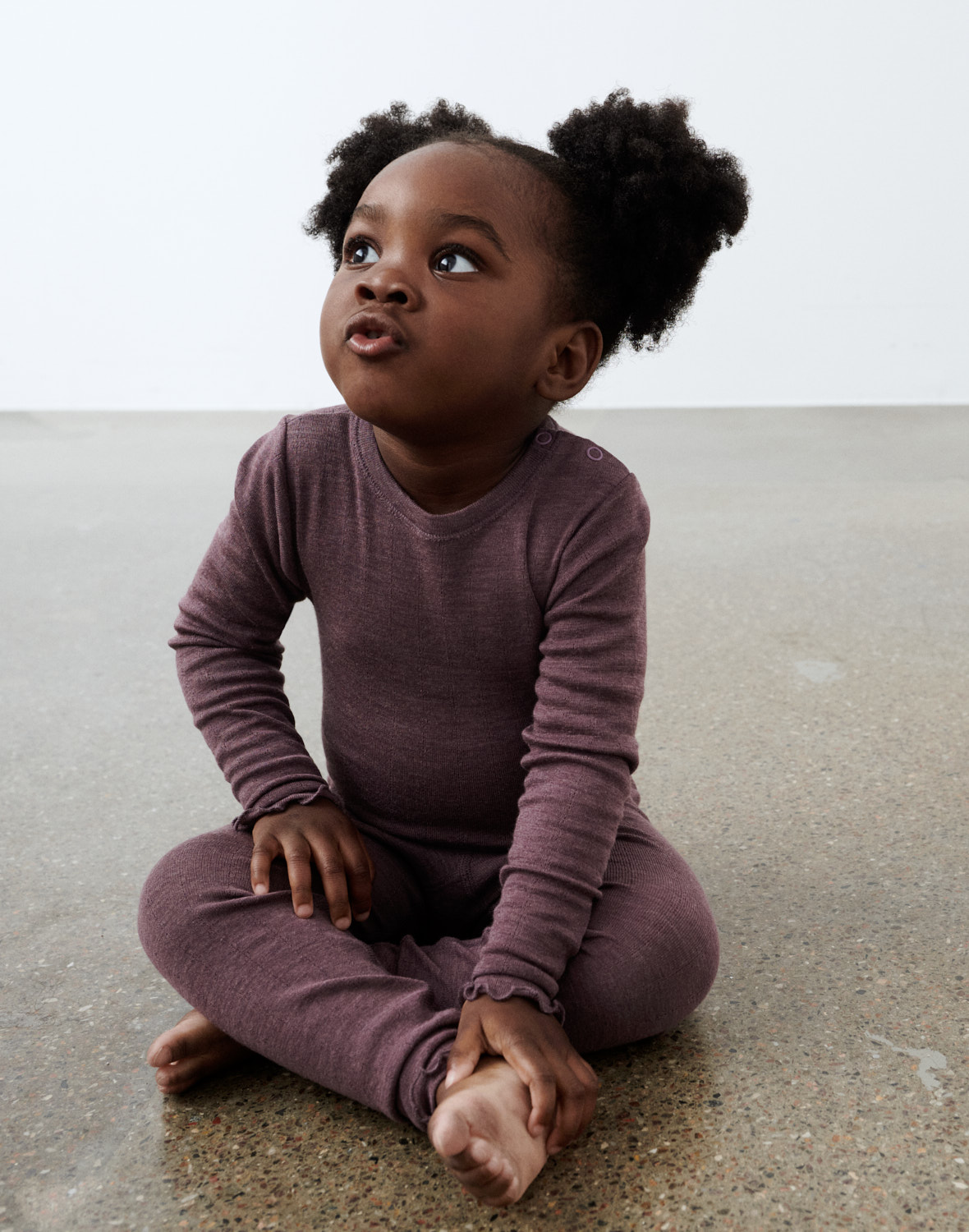 Pointelle romper met lange mouw van merinowol/zijde voor baby's