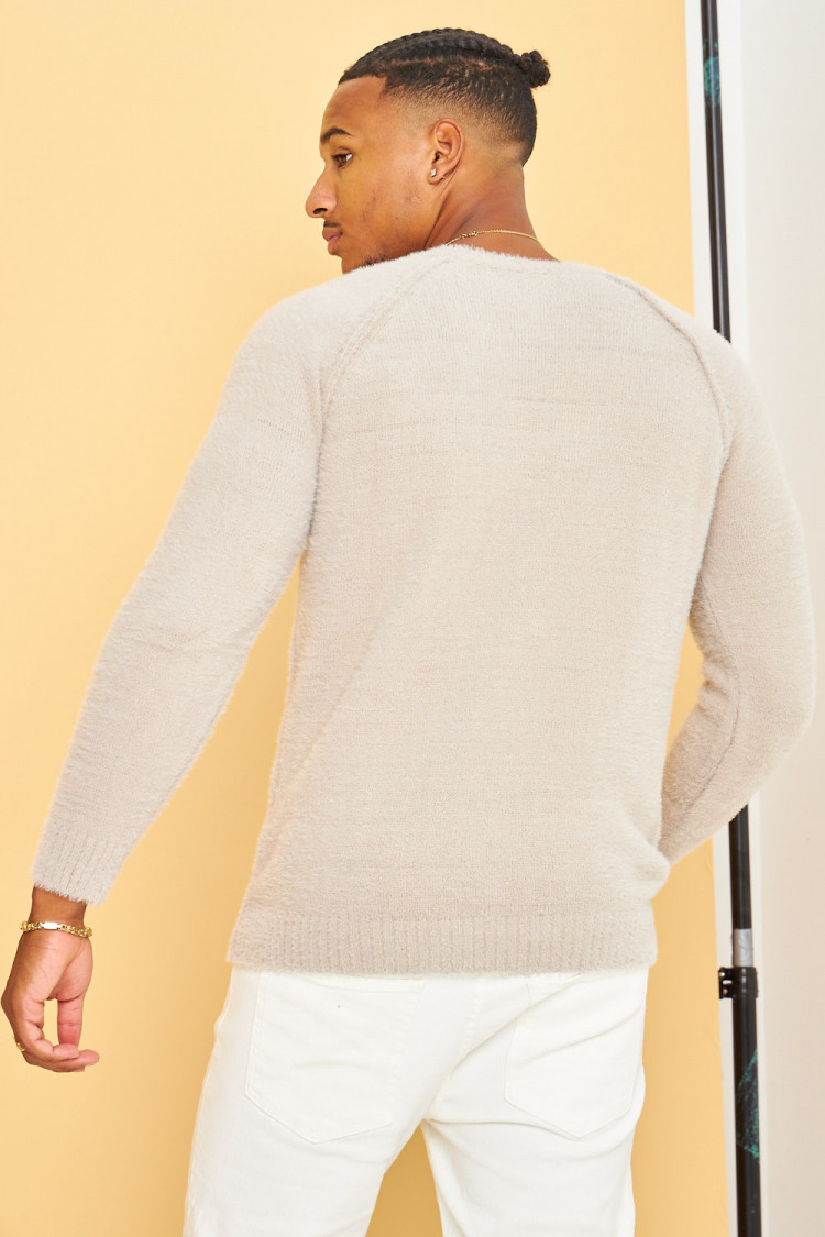 Pull beige en laine à col rond
