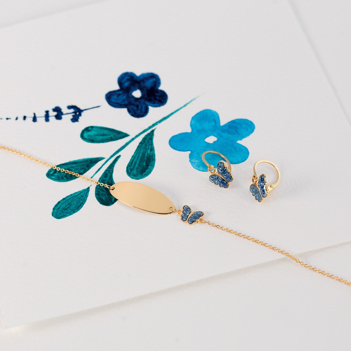 Boucles d'oreilles or 375 jaune et laque brisures papillons