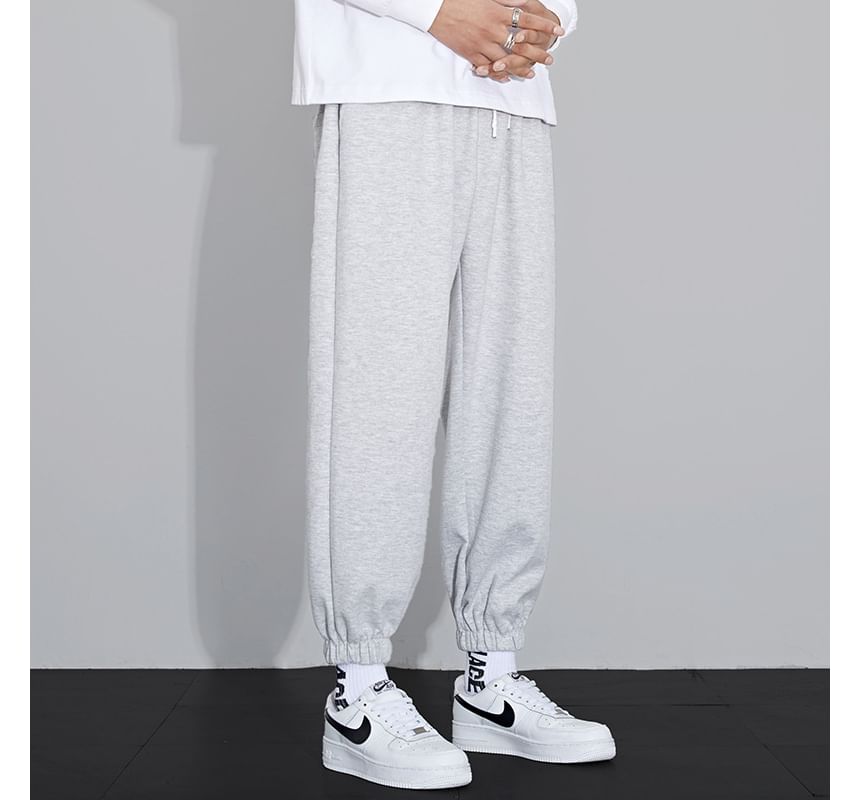 Acrius - Effen cropped harem-joggingbroek met trekkoord in de taille
