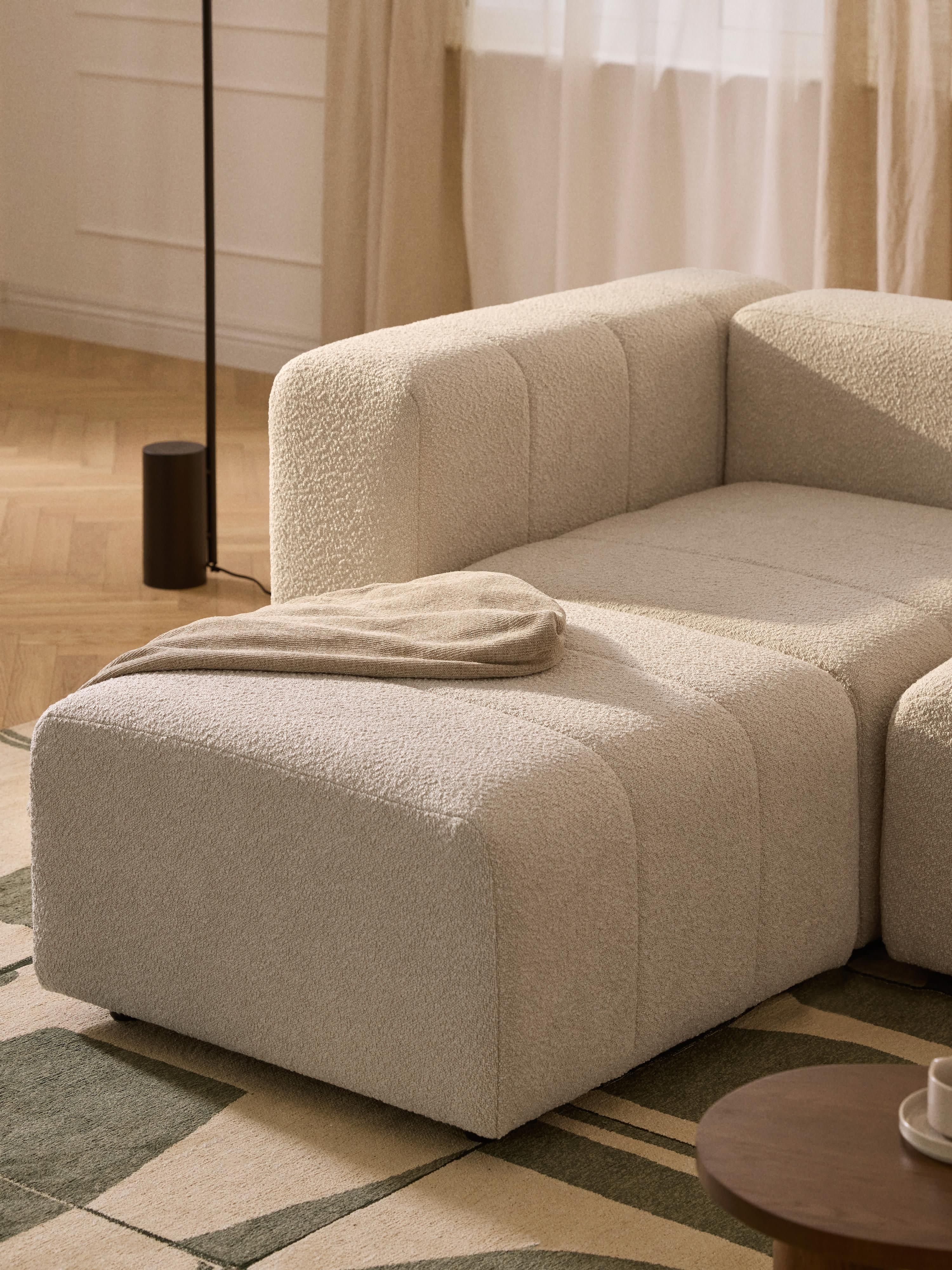 Modulaire bouclé bank Lena (3-zits) met poef (links/rechts)