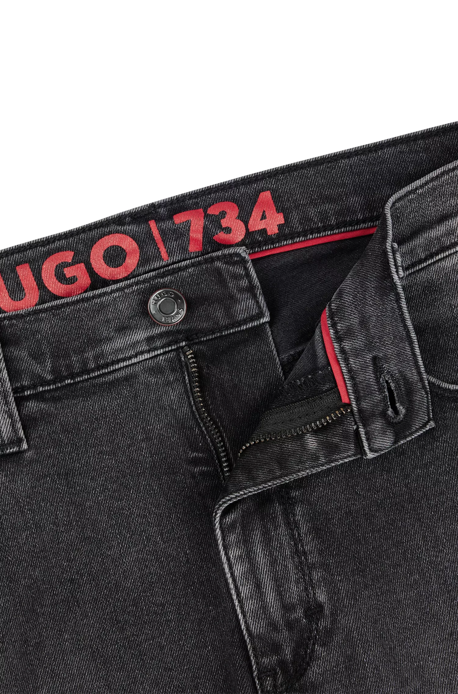 Calça jeans HUGO vermelha, corte extra slim, em denim com elasticidade para maior conforto.