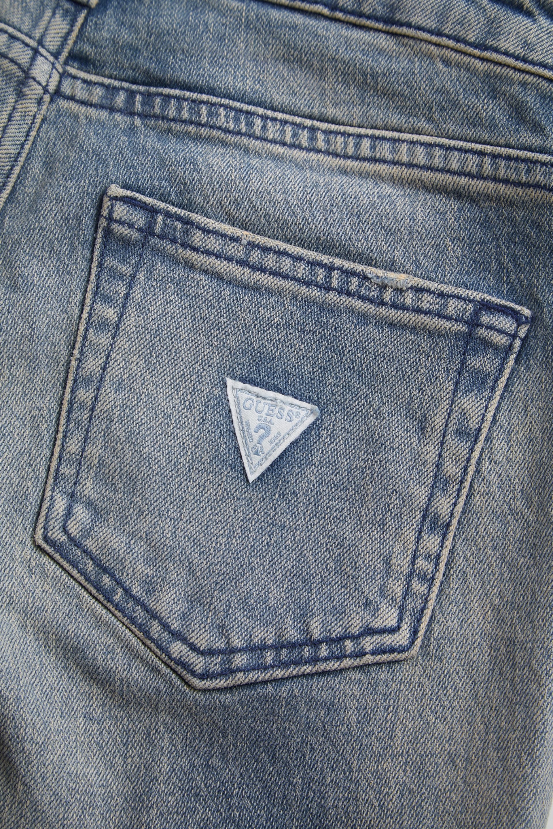 calça jeans flare