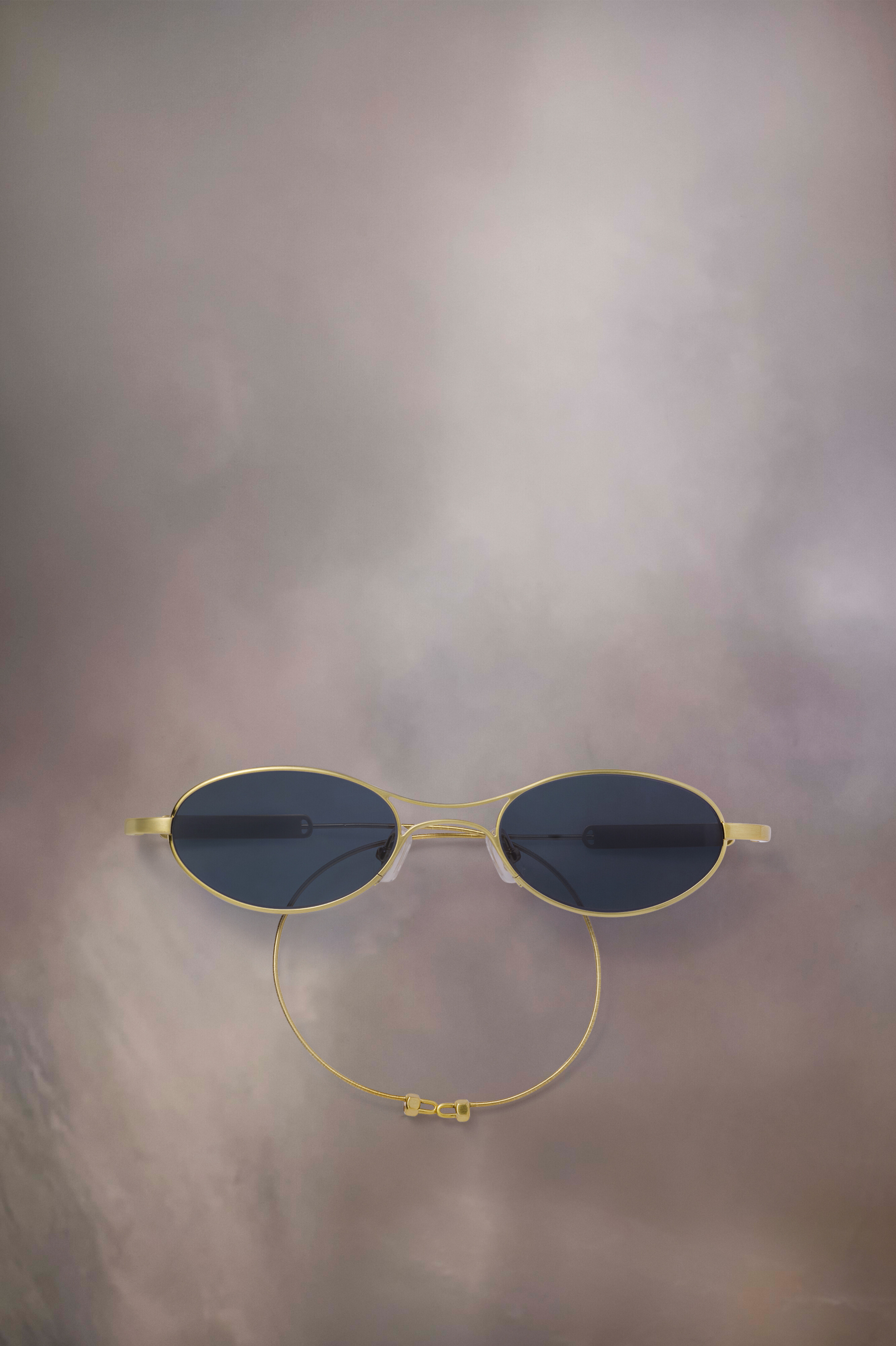 Lunettes de soleil ovales dorées x Gentle Monster​