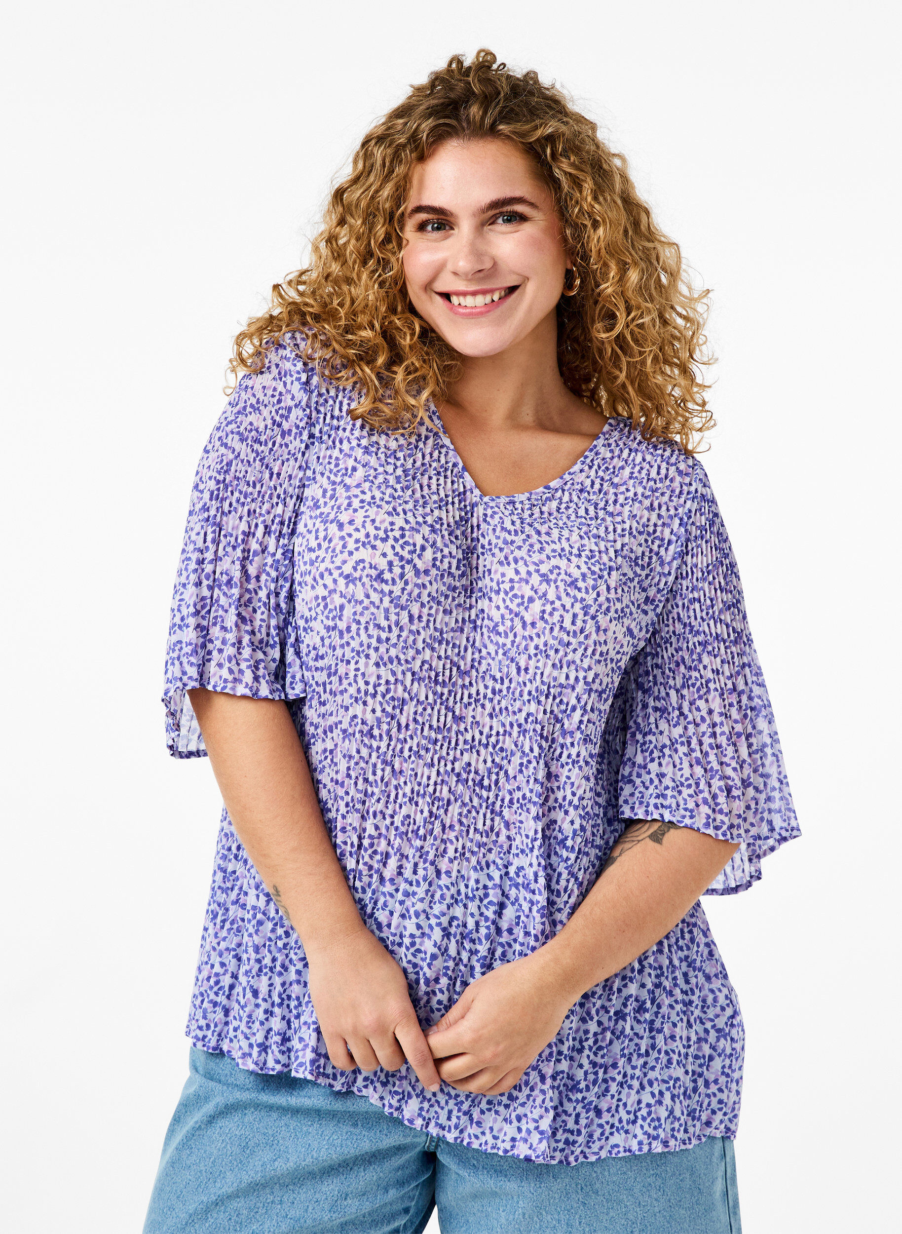 Blomstret bluse i plissé